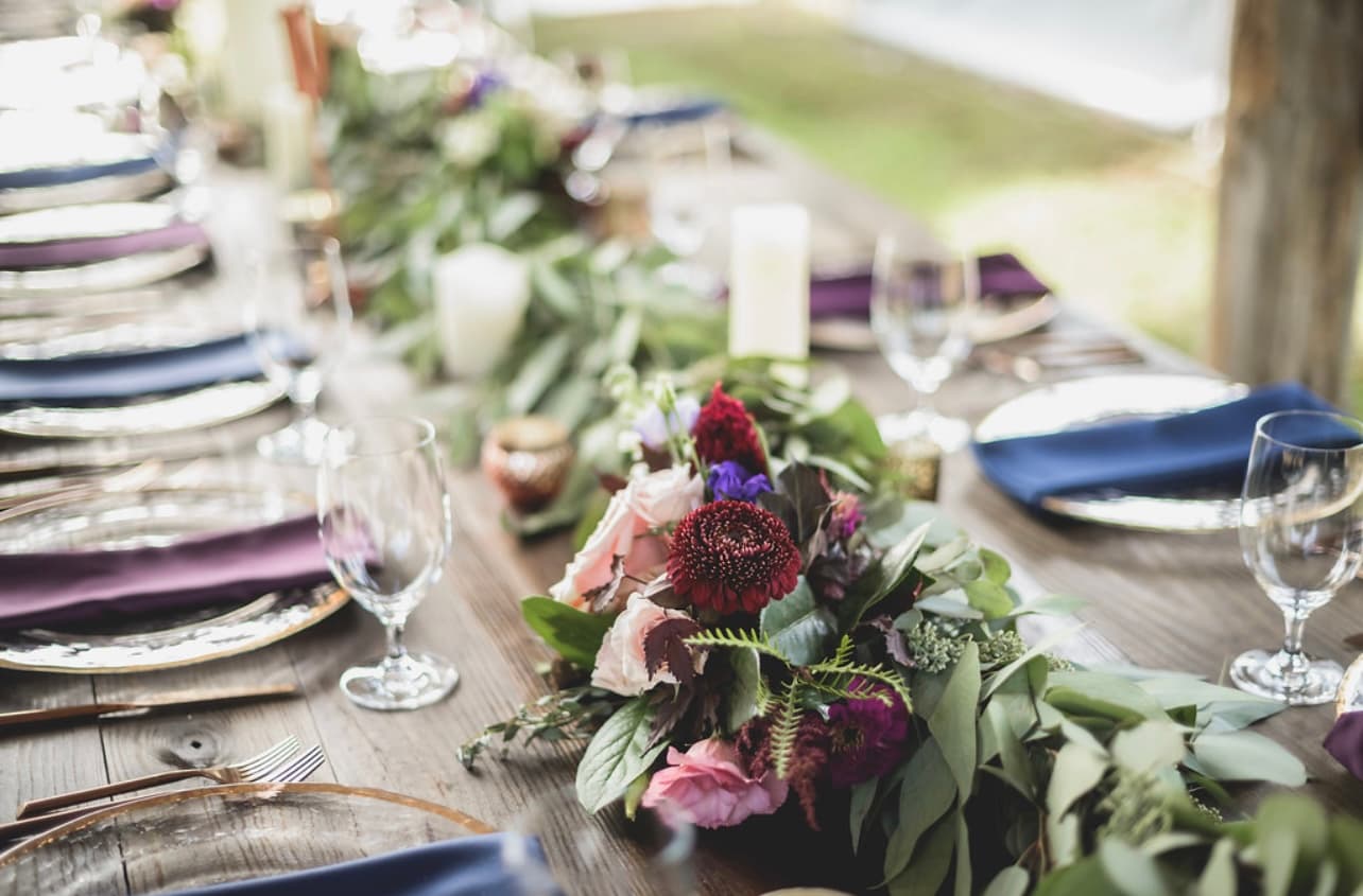 Elegant event table setting with floral centerpiece